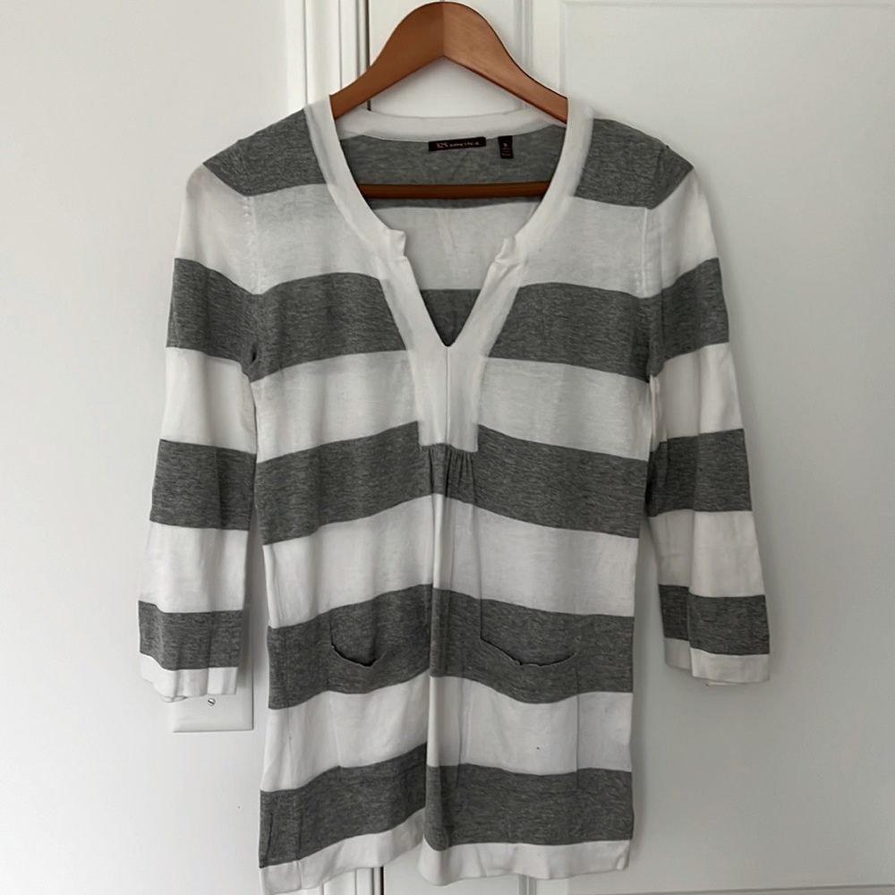 Grey and white stripped V neck sweater